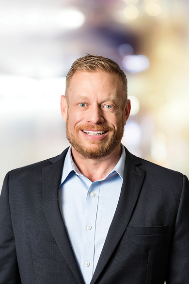 Portrait of Adam Linder, REALTOR®.